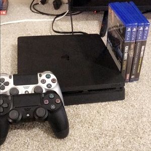 PS4 skin two controllers, six games.